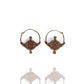 Pair of rose gold hoop earrings on a white background