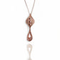 Rose gold necklace with a unique pendant on a white background