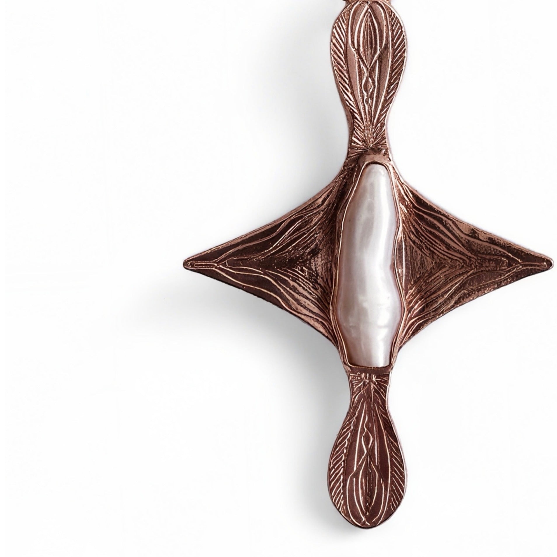 Closeup of rose gold necklace with freshwater pearls