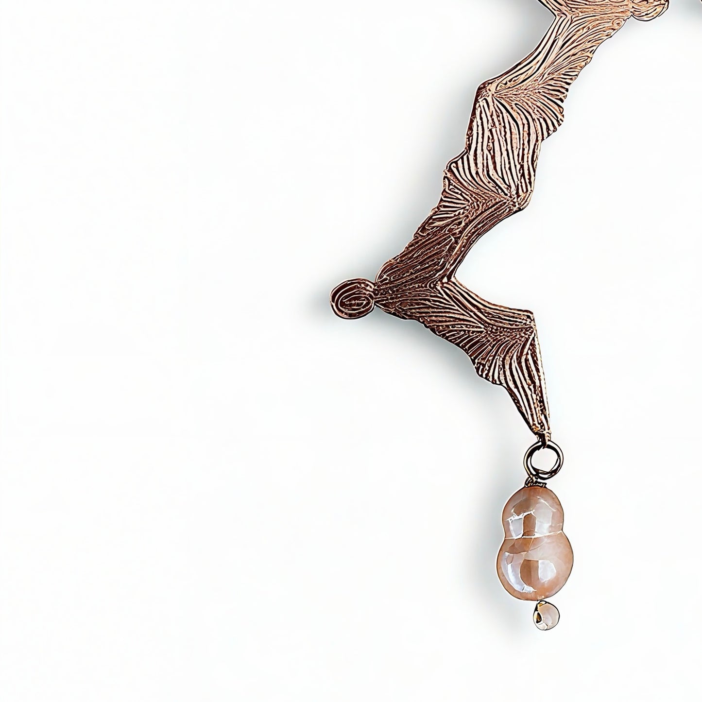 Rose gold earrings with peach pearls detail